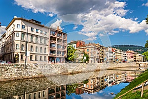Buildings in Sarajevo over the river Miljacka - Bosnia and Herzegovina