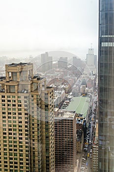 Buildings, Skyscrapers and Towers in Manhattan on a Foggy Day of Winter. Aerial View of New York City