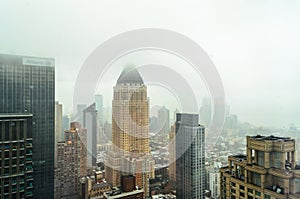 Buildings, Skyscrapers and Towers in Manhattan on a Foggy Day of Winter. Aerial View of New York City,