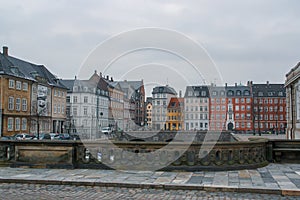 Buildings in the street and the Frederiksholms canal in the city of Copenhagen.