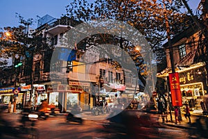 buildings and traffic at evening in Hanoi, Vietnam