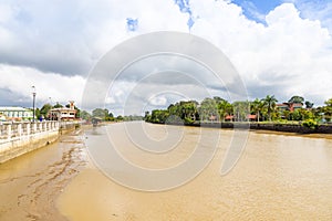 buildings and trees along Sungai Temburong river in the Temburong District in Brunei Darussalam