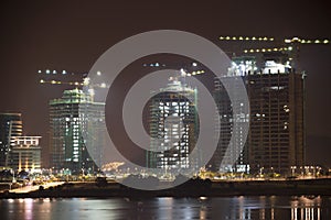 Buildings Under Construction at Night