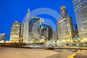 Buildings on Wacker Drive on the shore of Chicago River photo