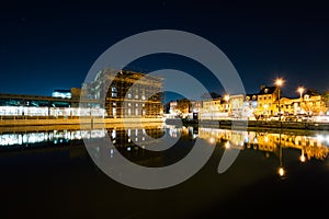 Buildings on the waterfront in Fells Point at night, in Baltimor photo