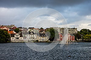 Buildings with waterworks near the Breiavatnet lake in Stavanger