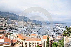buildings and yachts in a port in Monaco