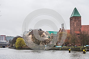 Builging at the riverbank of the spree river of red brick cathedral-like complex of the Markisches Museum marcher museum in a