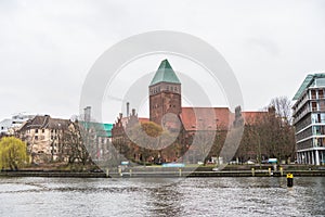 Builging at the riverbank of the spree river of red brick cathedral-like complex of the Markisches Museum marcher museum in a