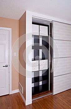 Built-in closet with sliding door shelving storage organization