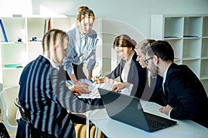 Buinesswoman with colleagues