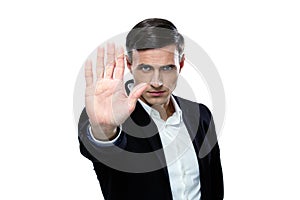 Buisnessman making stop gesture