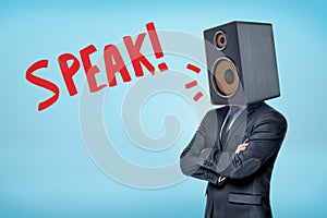 A buisnessman in a suit, with a big acoustic speaker instead of his head and the title `Speak` on a blue backround.