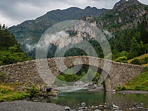 Bujaruelo ancient bridge in Pyrinees range, spain