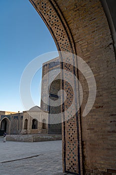 Bukhara, Uzbekistan. View of the entrance of Kalon madrasah during the sunset