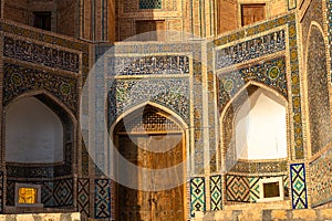 Bukhara, Uzbekistan. View of the entrance of Kalon madrasah during the sunset