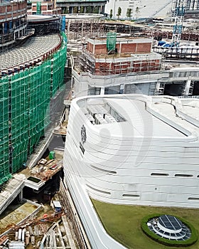 aerial view of a construction site with crane in city center. Building of a new mall in Kuala Lumpur, Malaysia. Bukit Bintang City photo