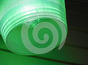 Bulb in green lampshade