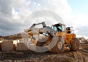 Buldozer in quarry