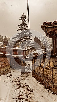 Bulgaria Koprivshtitsa old city cobblestone street in winter