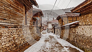 Bulgaria Koprivshtitsa old city cobblestone street in winter