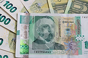 100 Bulgarian Lev Note on a Blurred Euro Background