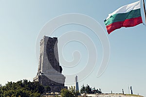 Bulgarian monument Shipka and national flag Liberty day Historical memorial