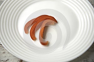 Bulgarian red pepper slices on white plate