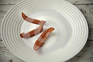 Bulgarian red pepper slices on white plate