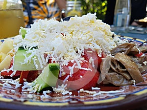 Bulgarian shepherd salad with a drink