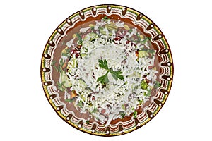 Bulgarian Shopska salad isolated on white