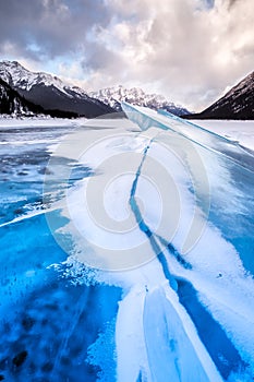 Bulged, cracked ice on the Spray Lakes Reservoir in Spray Lakes Provincial Park, Kananaskis Country, Alberta