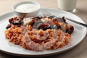 Bulgur pilaf and Greek yogurt photo