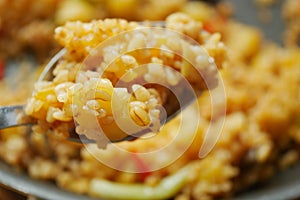 bulgur rice on a spoon