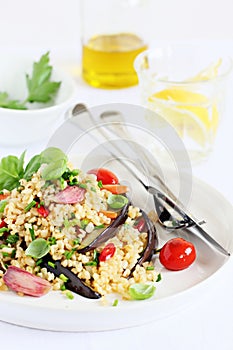 Bulgur salad with vegetables and herbs