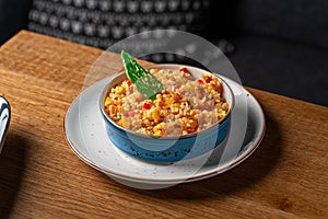 Bulgur with vegetables. Healthy food, close-up. Serving food in a restaurant