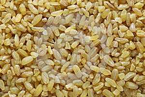 bulgur wheat background. bulgur wheat texture. top view close up