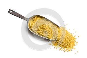 Bulgur wheat in metal scoop photo