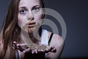 Bulimic girl and snack photo