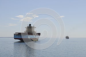 Bulk Cargo Ship Stranded, Low Tide, Ferry Boat Background