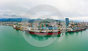 Bulk cargo ship under port crane, Batumi seaport, Georgia