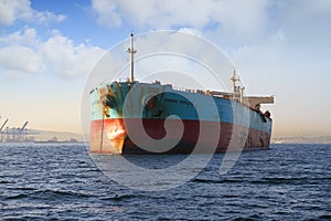 Bow view of bulk carrier ship Maersk Privilege anchored in Algeciras bay in Spain.