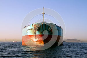 Bow view of bulk carrier ship Maersk Privilege anchored in Algeciras bay in Spain.