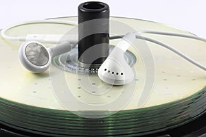 Bulk Cds and earphones