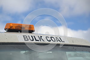 Bulk coal management vehicle