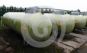 Bulk gas storage tanks in protective compound.