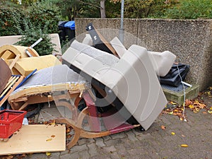 Bulky waste, garbage, unnecessary furniture, big trash on streets of Germany.