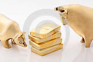 Bull and bear markets symbols with gold bars