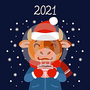 The bull with a cup of tea in winter wear. Ox with a cocoa standing in snow. The symbol of the Chinese New Year 2021. Greeting