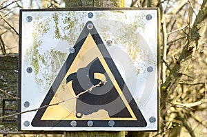 Bull in field warning sign